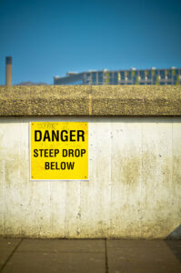 DANGER steep drop below