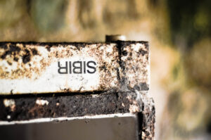The upside-down, old, rusty fridge.
