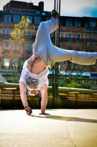 Handstand iPod Pickup - Lorian Biet Lorian kept dropping his iPod mid-handstand but managed to keep picking it back up.