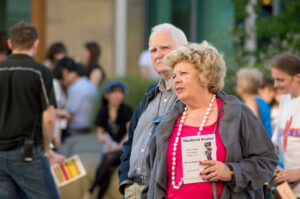 Couple, in the crowds. Flickr | Facebook