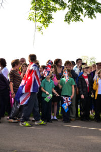 Sheffield Olympic Torch Relay 2012 Children lined up with union Jack flags in Hillsborough Park, waiting for the Torch…