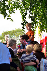 Sheffield Olympic Torch Relay 2012 A young Boy sits atop his Father's shoulders in hope of getting a better glimpses of…
