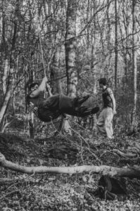 Nic, on a swing.