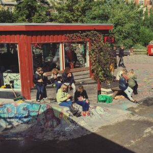 People catching a break in the clouds. #christiania #Copenhagen (at Christiania - Green Light District)