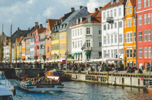 Nyhavn, Copenhagen Nyhavn (Danish pronunciation: [ˈnyhɑʊ̯ˀn]) (literally: New Harbour) is a 17th-century waterfront, ca…
