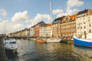 Nyhavn, Copenhagen Nyhavn (Danish pronunciation: [ˈnyhɑʊ̯ˀn]) (literally: New Harbour) is a 17th-century waterfront, ca…
