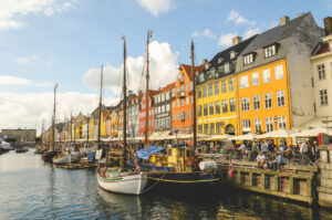 Nyhavn, Copenhagen Nyhavn (Danish pronunciation: [ˈnyhɑʊ̯ˀn]) (literally: New Harbour) is a 17th-century waterfront, ca…