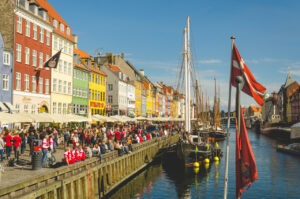 Nyhavn, Copenhagen Nyhavn (Danish pronunciation: [ˈnyhɑʊ̯ˀn]) (literally: New Harbour) is a 17th-century waterfront, ca…