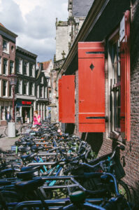 A sex shop, some bikes and a church. View on 500px
