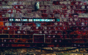 NO PARKING ON THIS PAVEMENT
